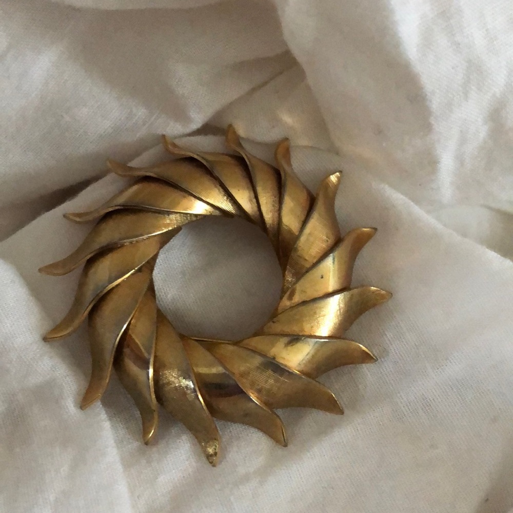 Gold sun pin